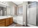 Bathroom featuring a bathtub, shower, and dual-sized mirror at 6505 S 15Th Dr, Phoenix, AZ 85041