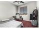 Bedroom featuring carpeted floors, a bed, and a window at 6505 S 15Th Dr, Phoenix, AZ 85041