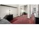 Bedroom featuring a shelf, a mirrored sliding-door closet, and a single bed at 6505 S 15Th Dr, Phoenix, AZ 85041