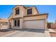 Charming two-story home with a two-car garage and low-maintenance desert landscaping at 6505 S 15Th Dr, Phoenix, AZ 85041