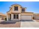 Charming two-story home with a two-car garage and low-maintenance desert landscaping at 6505 S 15Th Dr, Phoenix, AZ 85041