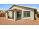 House backyard with patio area and rock landscaping at 6875 W Townley Ave, Peoria, AZ 85345