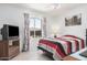 Comfortable bedroom featuring tile flooring and a ceiling fan at 916 W Loughlin Dr, Chandler, AZ 85225