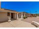 Inviting single-story home featuring a covered entrance, xeriscaped yard, and well-maintained walkway at 916 W Loughlin Dr, Chandler, AZ 85225