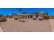 This home features low maintenance desert landscaping and bench seating at 916 W Loughlin Dr, Chandler, AZ 85225