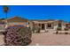 This home's front yard features solar panels, desert landscaping and bench seating at 916 W Loughlin Dr, Chandler, AZ 85225