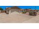 Spacious two-car garage with a wide driveway, and well-maintained landscaping for added curb appeal at 916 W Loughlin Dr, Chandler, AZ 85225