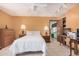 Cozy main bedroom features neutral walls, tile flooring, and ample natural light at 916 W Loughlin Dr, Chandler, AZ 85225