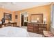 The main bedroom features tile flooring and a ensuite bathroom at 916 W Loughlin Dr, Chandler, AZ 85225