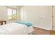 This bedroom has a window, neutral carpet, and white walls at 9658 W Golddust Dr, Queen Creek, AZ 85144