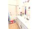 Bathroom featuring a shower/tub, a toilet, and vanity at 11424 S Obispo Dr, Goodyear, AZ 85338