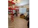 Bedroom featuring a lofted bed and a red ladder at 11424 S Obispo Dr, Goodyear, AZ 85338