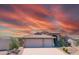 Inviting single-Gathering home with a well-maintained front yard and a convenient three-car garage at 11424 S Obispo Dr, Goodyear, AZ 85338