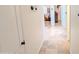 Neutral hallway with tiled floors and recessed lighting at 11424 S Obispo Dr, Goodyear, AZ 85338