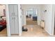 Hallway provides access to a bedroom with carpet and a living area at 11424 S Obispo Dr, Goodyear, AZ 85338