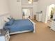 Large main bedroom with carpet floors and a ceiling fan at 11424 S Obispo Dr, Goodyear, AZ 85338