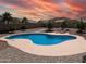 Backyard featuring a private pool and patio furniture at 11424 S Obispo Dr, Goodyear, AZ 85338