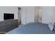 Spacious bedroom with adjacent bathroom, modern furnishings, and a calming color palette at 1221 E Jahns Dr, Casa Grande, AZ 85122