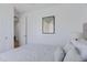 Serene bedroom showcasing a neutral color palette, soft decor, and clean lines at 1221 E Jahns Dr, Casa Grande, AZ 85122