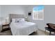 Cozy bedroom featuring a large window and neutral decor at 1221 E Jahns Dr, Casa Grande, AZ 85122