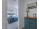 Hallway leading into bedroom, accented by a blue cabinet with decor on top at 1221 E Jahns Dr, Casa Grande, AZ 85122