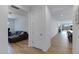 Hallway with view into living space with couch and dining area at 1221 E Jahns Dr, Casa Grande, AZ 85122