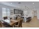 Open-concept kitchen and dining area with a kitchen island and modern countertops at 1221 E Jahns Dr, Casa Grande, AZ 85122