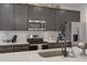 Detailed shot of kitchen area, highlighting stainless steel appliances and modern finishes at 1221 E Jahns Dr, Casa Grande, AZ 85122