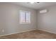 Bedroom with neutral walls, carpet, a ceiling fan, and a window with blinds at 12801 W Sweetwater Ave, El Mirage, AZ 85335