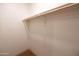 Walk-in closet with a hanging rod, offering ample storage space at 1309 W Lynwood St, Phoenix, AZ 85007