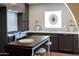 Well-appointed kitchen boasting updated appliances, stylish backsplash, and ample counter space at 1309 W Lynwood St, Phoenix, AZ 85007