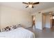 Bright bedroom with doorways leading to the kitchen and bathroom at 131 N Higley Rd # 41, Mesa, AZ 85205