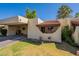 Charming single-story home with a landscaped front yard and a covered parking area at 131 N Higley Rd # 41, Mesa, AZ 85205