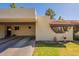 Inviting front exterior featuring desert landscaping, covered parking, and stylish architectural details at 131 N Higley Rd # 41, Mesa, AZ 85205