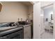 The laundry room featuring updated appliances at 131 N Higley Rd # 41, Mesa, AZ 85205