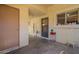 Enclosed patio featuring outdoor seating and decorative items for a cozy atmosphere at 131 N Higley Rd # 41, Mesa, AZ 85205