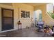 Cozy patio area with comfortable seating, plants, and decorative accents at 131 N Higley Rd # 41, Mesa, AZ 85205
