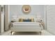 Serene bedroom with a stylish headboard, plush pillows, matching lamps, and elegant decor creating a tranquil and inviting space at 1385 W Ridge Rd, Apache Junction, AZ 85120