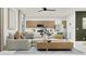Open-concept living area with a comfortable sectional sofa, stylish coffee table, and modern decor at 1385 W Ridge Rd, Apache Junction, AZ 85120