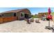 Inviting backyard with patio, firepit, and play structure for outdoor enjoyment at 15740 W Washington St, Goodyear, AZ 85338