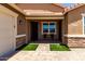 Charming front porch with seating and stylish brick walkway at 15740 W Washington St, Goodyear, AZ 85338