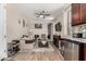 Inviting living room features tile floors and kitchen access at 15740 W Washington St, Goodyear, AZ 85338