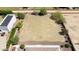 Large residential lot with desert landscaping, surrounded by luxury houses and ample space for outdoor activities at 16386 W Papago St, Goodyear, AZ 85338