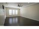 Spacious living room with hardwood floors and natural light at 16386 W Papago St, Goodyear, AZ 85338