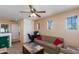 Comfortable living room with neutral colors and ceiling fan at 19324 N Del Mar Ave, Maricopa, AZ 85138