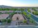 Aerial view of single Gathering home with desert landscaping and mountain backdrop at 19334 W Pasadena Ave, Litchfield Park, AZ 85340