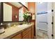 Cozy bathroom with a vanity and a view of the shower and toilet areas at 19334 W Pasadena Ave, Litchfield Park, AZ 85340
