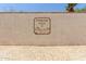 Community sign for Overland Hills II features desert landscape and stucco wall at 19833 N 47Th Ln, Glendale, AZ 85308