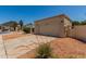 Attached two-car garage with neutral exterior and well-maintained landscaping at 19833 N 47Th Ln, Glendale, AZ 85308