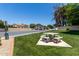 Community picnic area features a picnic table and well-maintained lawn space at 19833 N 47Th Ln, Glendale, AZ 85308